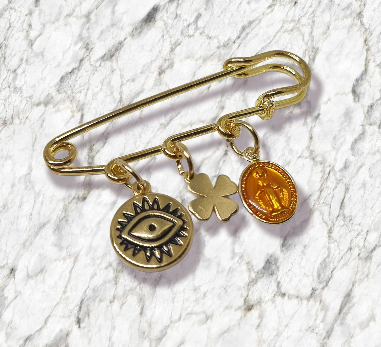 Broche porte - bonheur