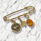 Broche porte - bonheur